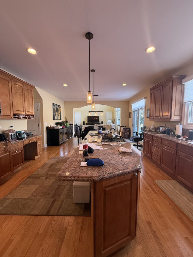 Kitchen Remodel in Vernon Hills - Before - Reverse angle of the island out to dining room