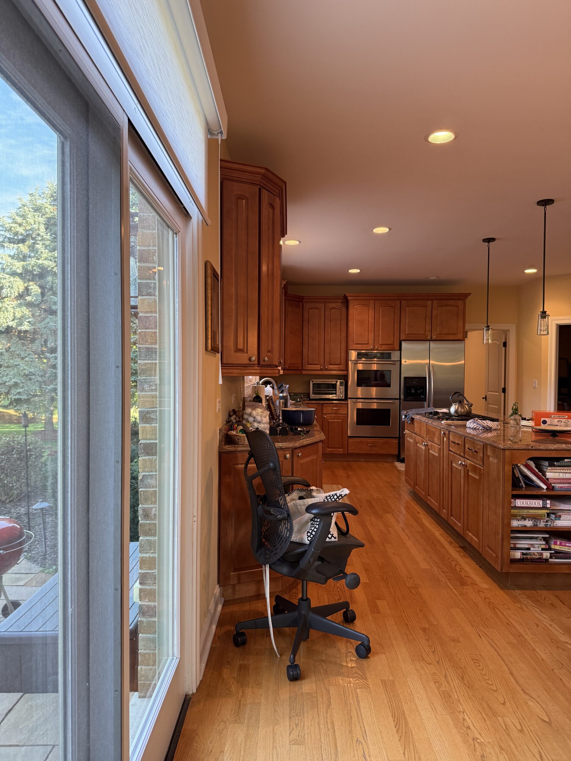 Kitchen Remodel in Vernon Hills - Before - Including deep view into kitchen along island and close to back door.